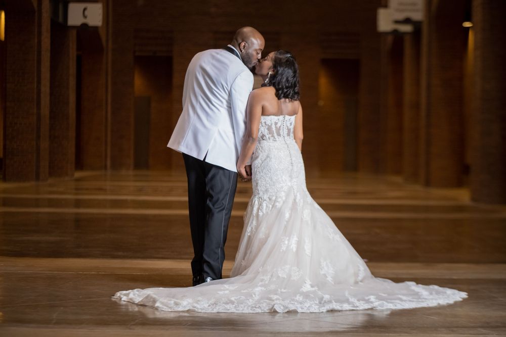 Bride and groom kissing