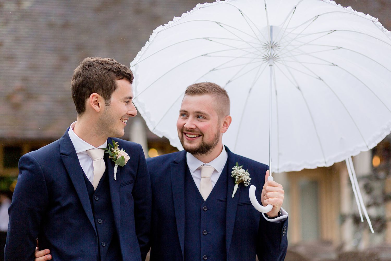 groom with umbrella
