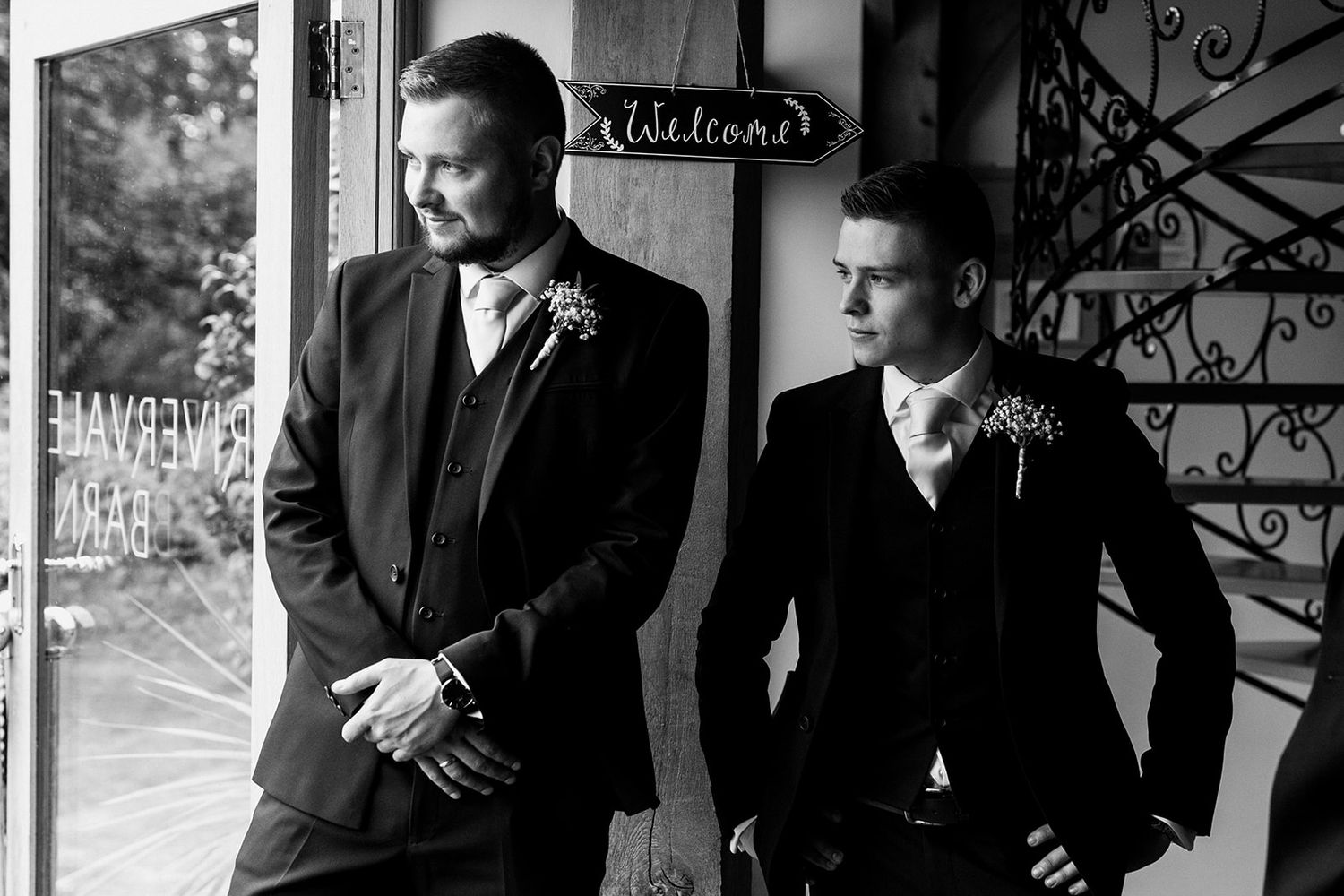 groomsmen waiting to greet wedding guests