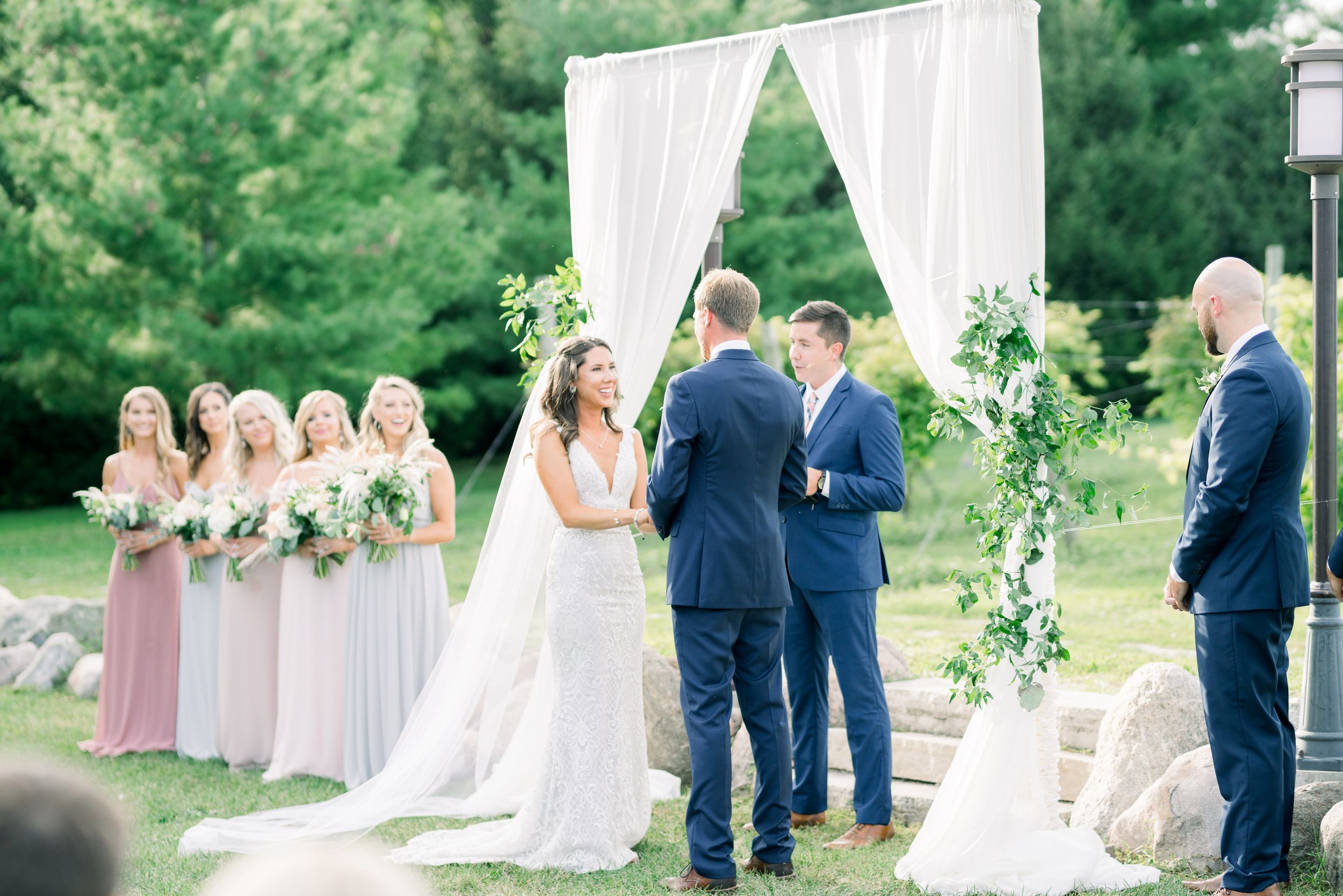 Vineyard photos with white willow events at Prairie Moon Winery wedding in Ames, Iowa with light and airy photography