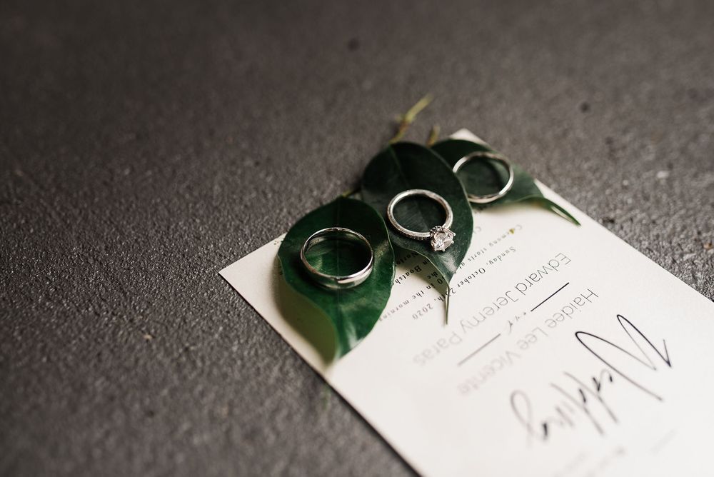 invitation suite and wedding rings details