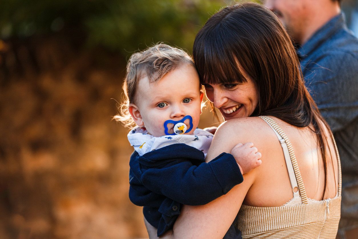 mother and son looking at camera