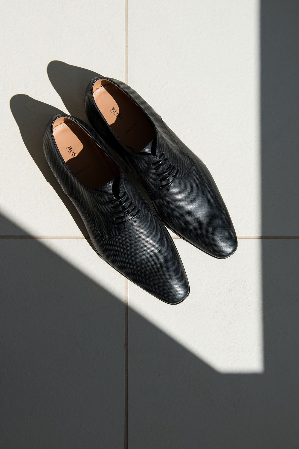groom's black shoes