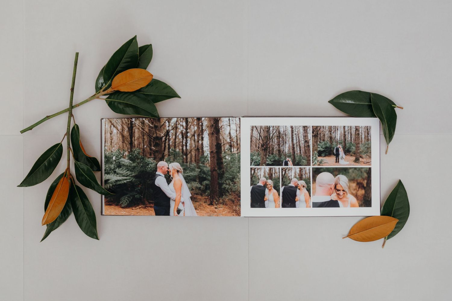 flushmount album with floral flat lay