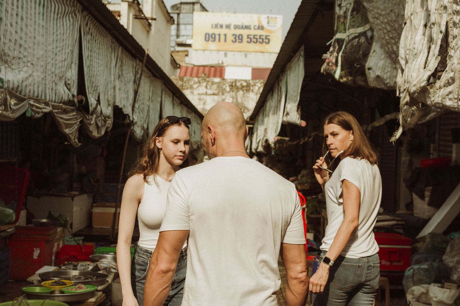 Family photoshoot in Ben Thanh Market in D1 Saigon by Anastasia Sokyrka Photography based in Vietnam