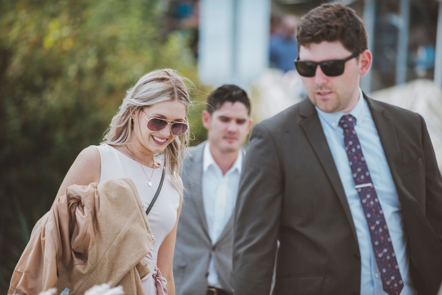 Guests arriving for a beach wedding. Wedding planning timeline.