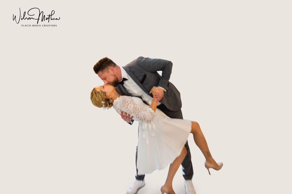 German couple enjoying kissing during wedding