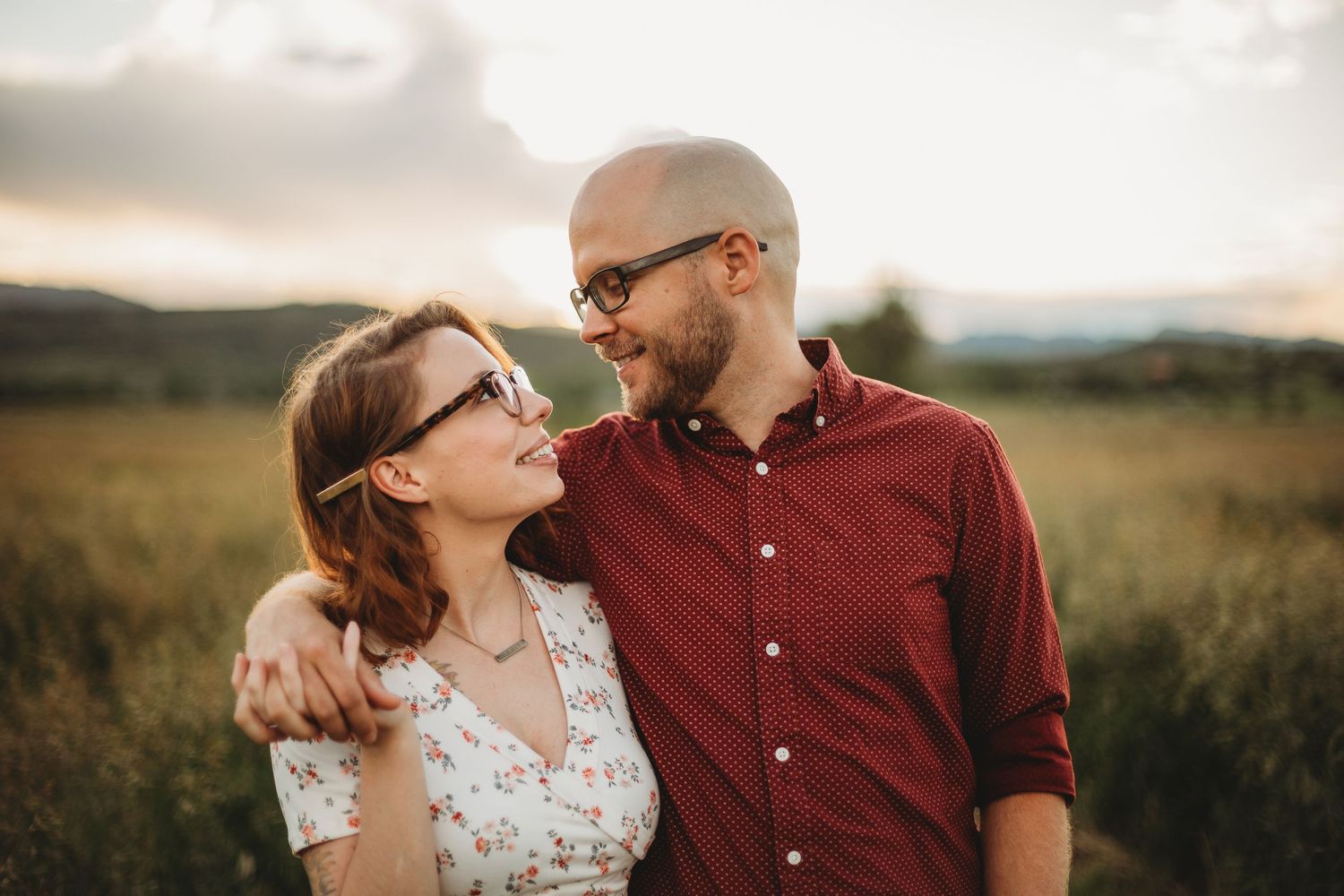 A couple gets their photos taken during their engagement session at Reservoir Ridge Natural Area in Fort Collins.