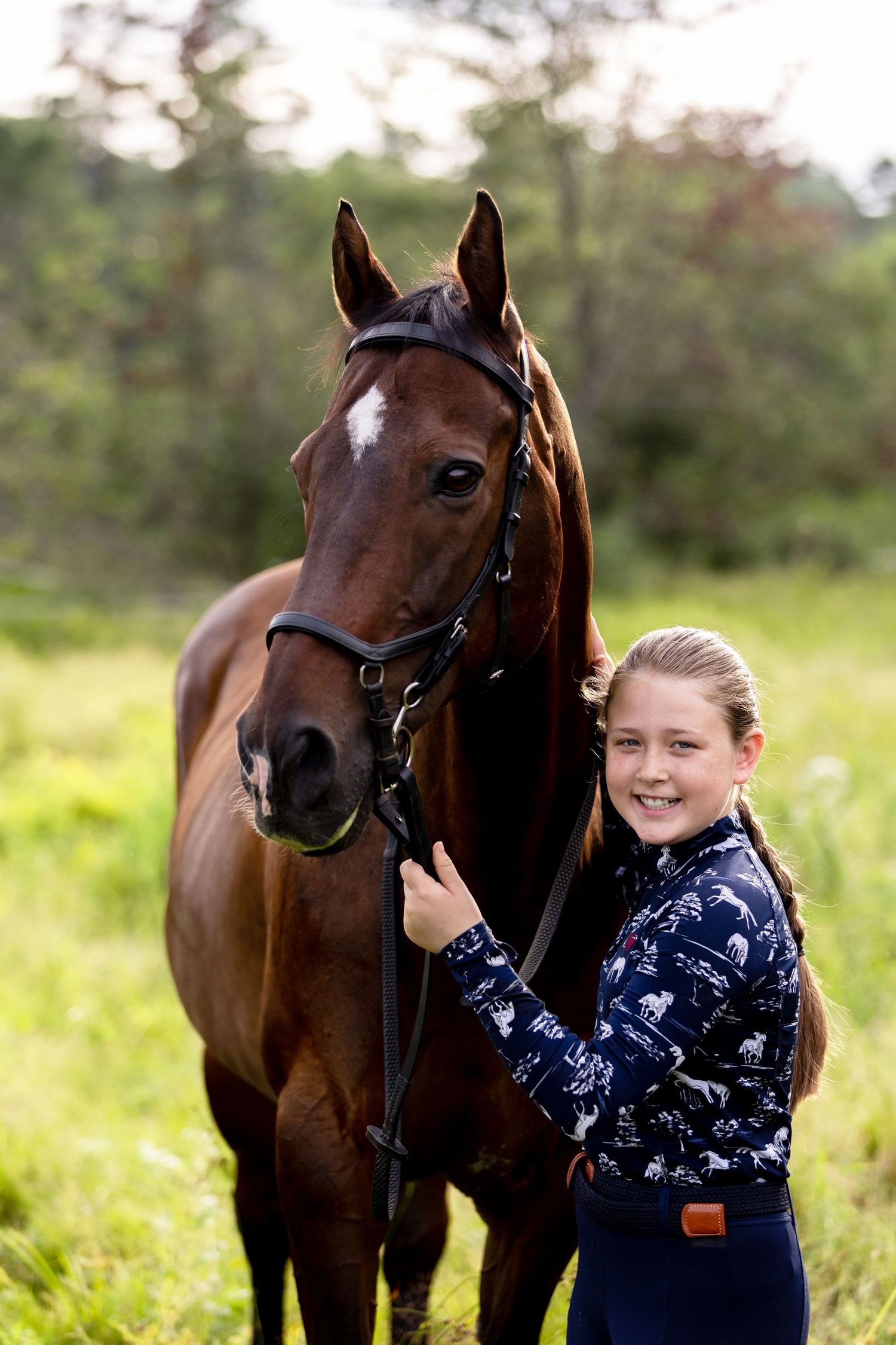 horse and rider portrait session sunset Kerrits Ariat young girl French braid equestrian styling