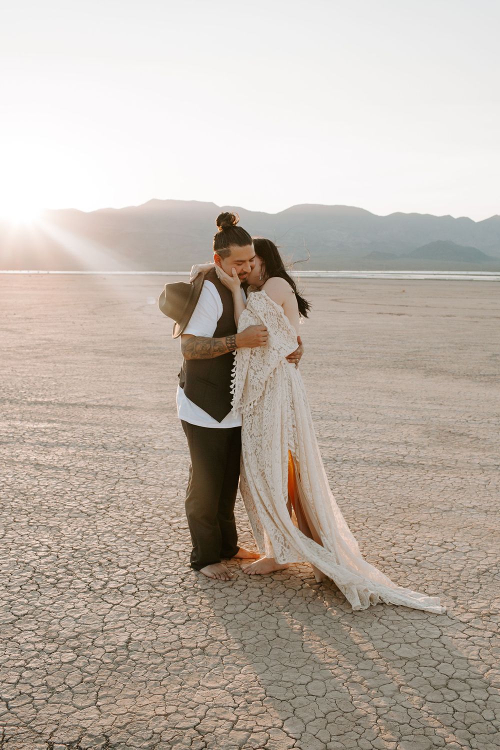woman kissing her husbands neck during their elopement