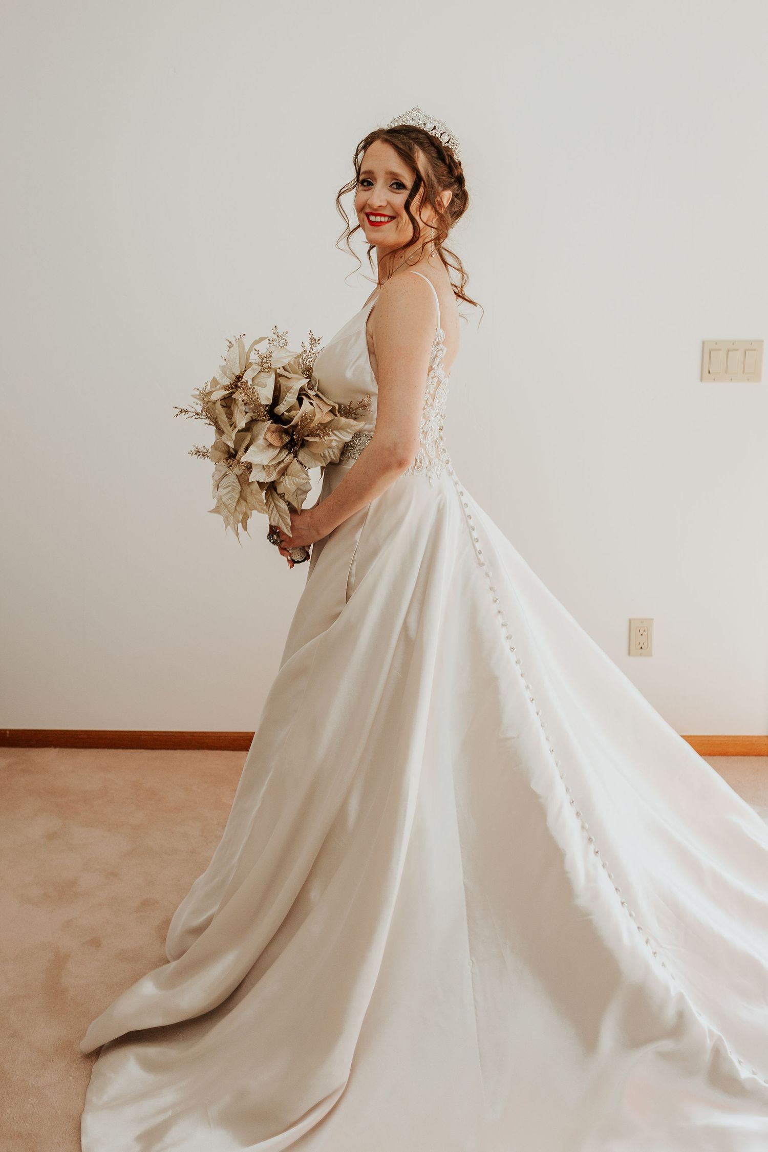 Colorado bride poses for a photo during her Loveland wedding.