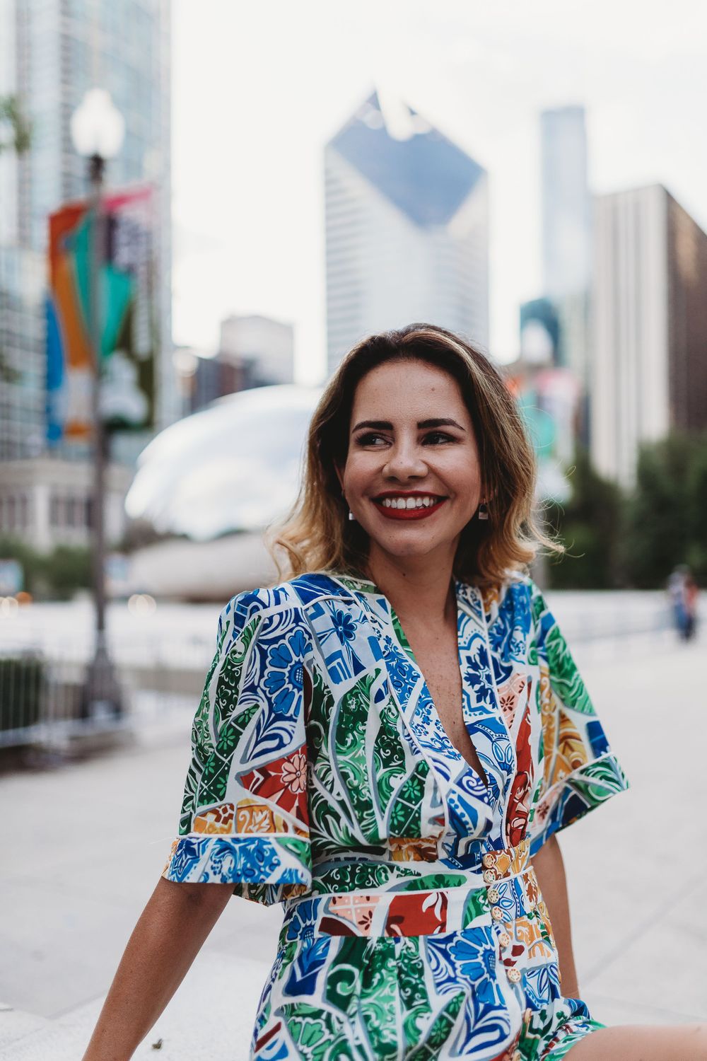 Woman sitting by Bean downtown Chicago portraits lifestyle session