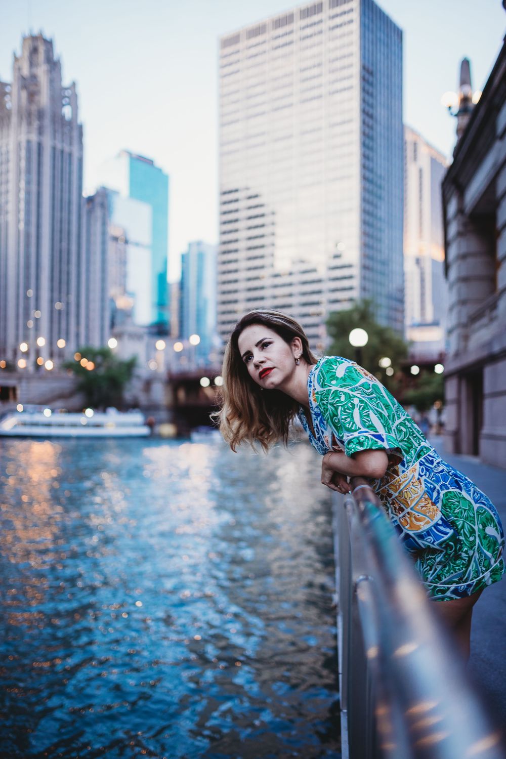 Woman standing by river on Riverwalk Chicago portraits lifestyle session