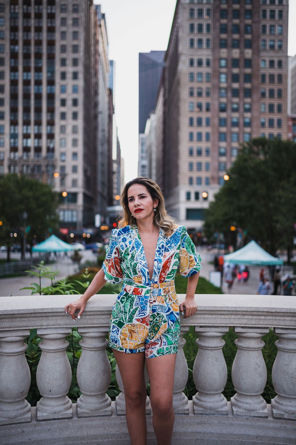 Woman standing with building in the background downtown Chicago portraits lifestyle session