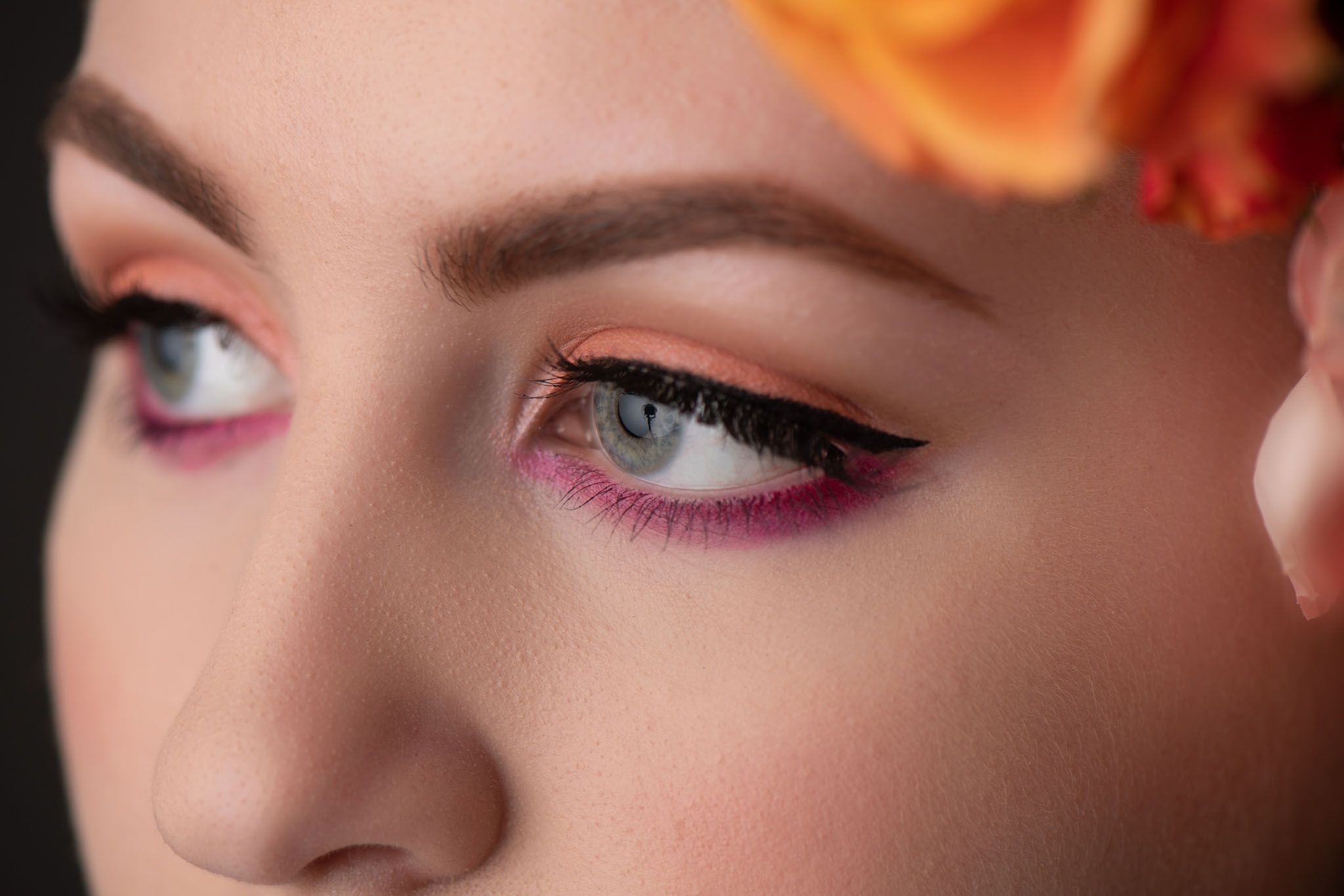 liquid eyeliner, pink and orange eyeshadow
