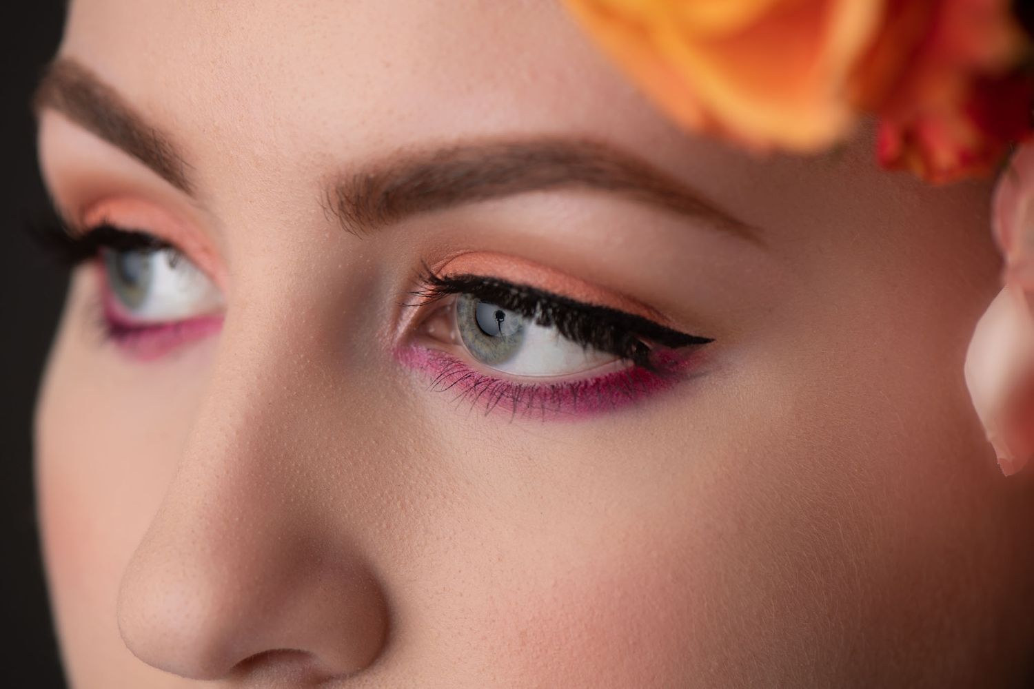liquid eyeliner, pink and orange eyeshadow