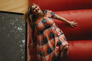 girl smiling in a bounce house
