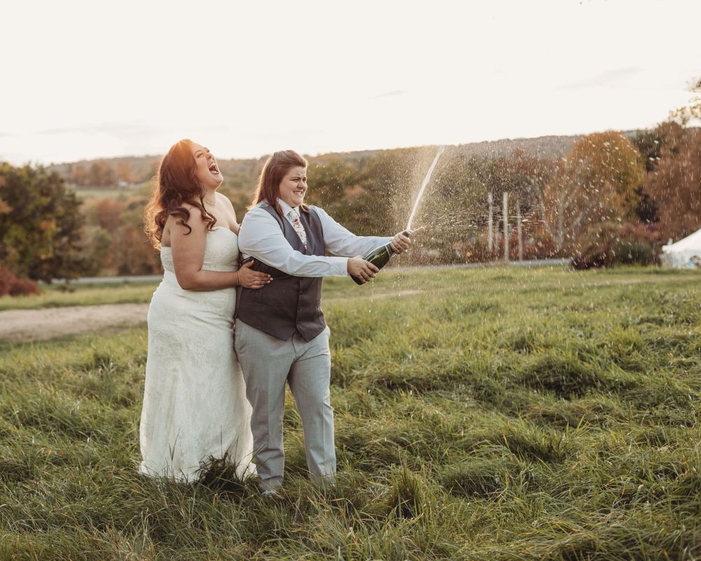Professional wedding photo - popping champagne