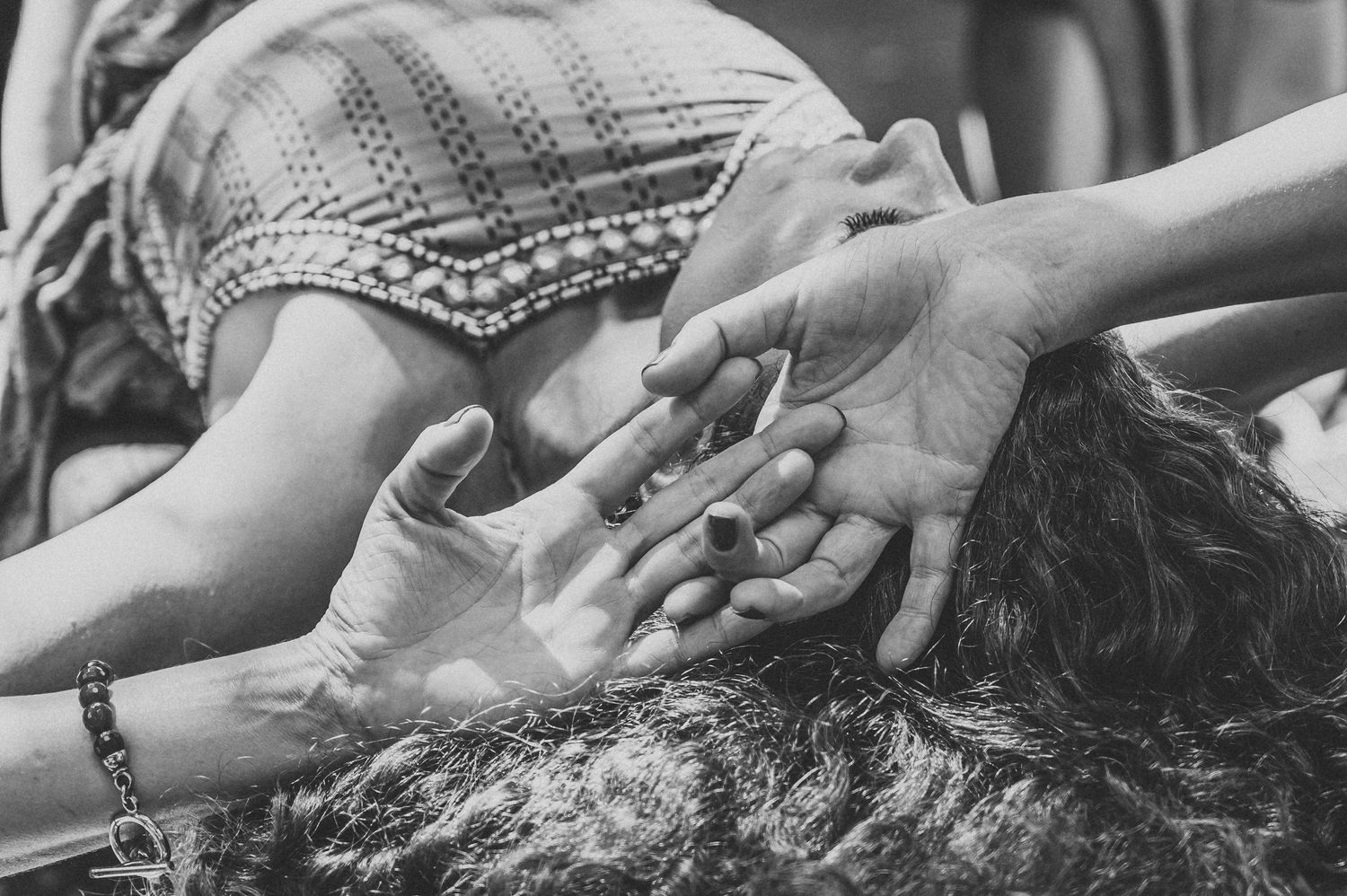 Artistic black and white image of a woman lying down. SIX84 Photography, Portrait Photography, Sydney