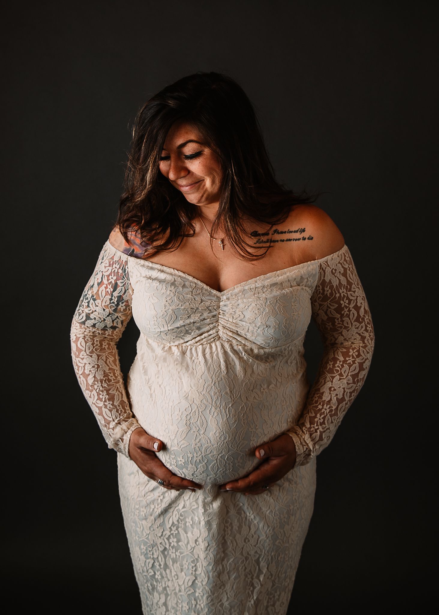 white lacy maternity dress studio session