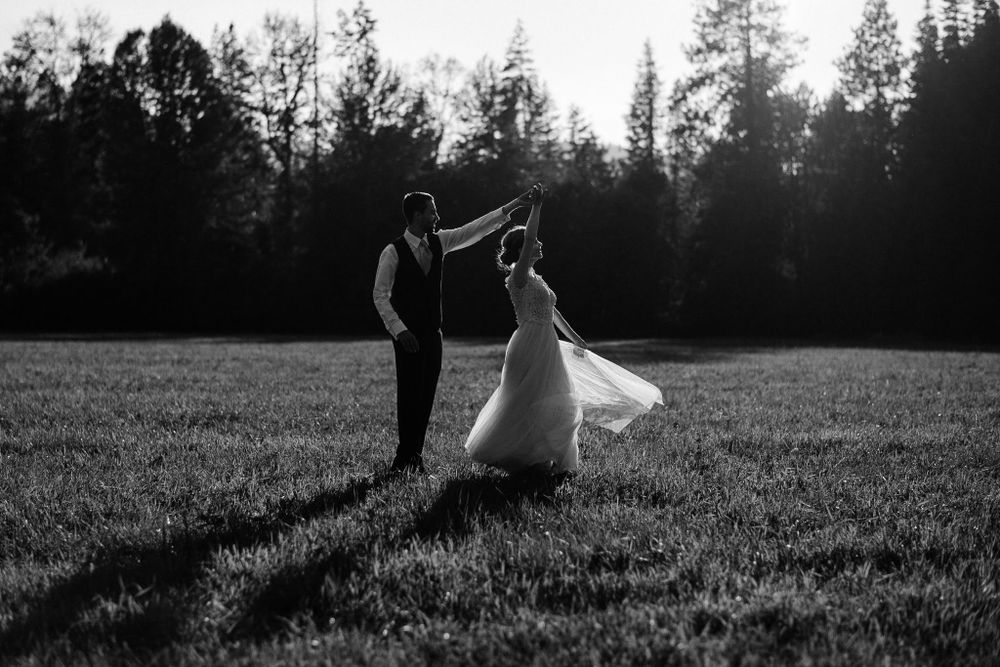 Bride & Groom dance in a field outside Ritter Farms, in Cle Elum, WA