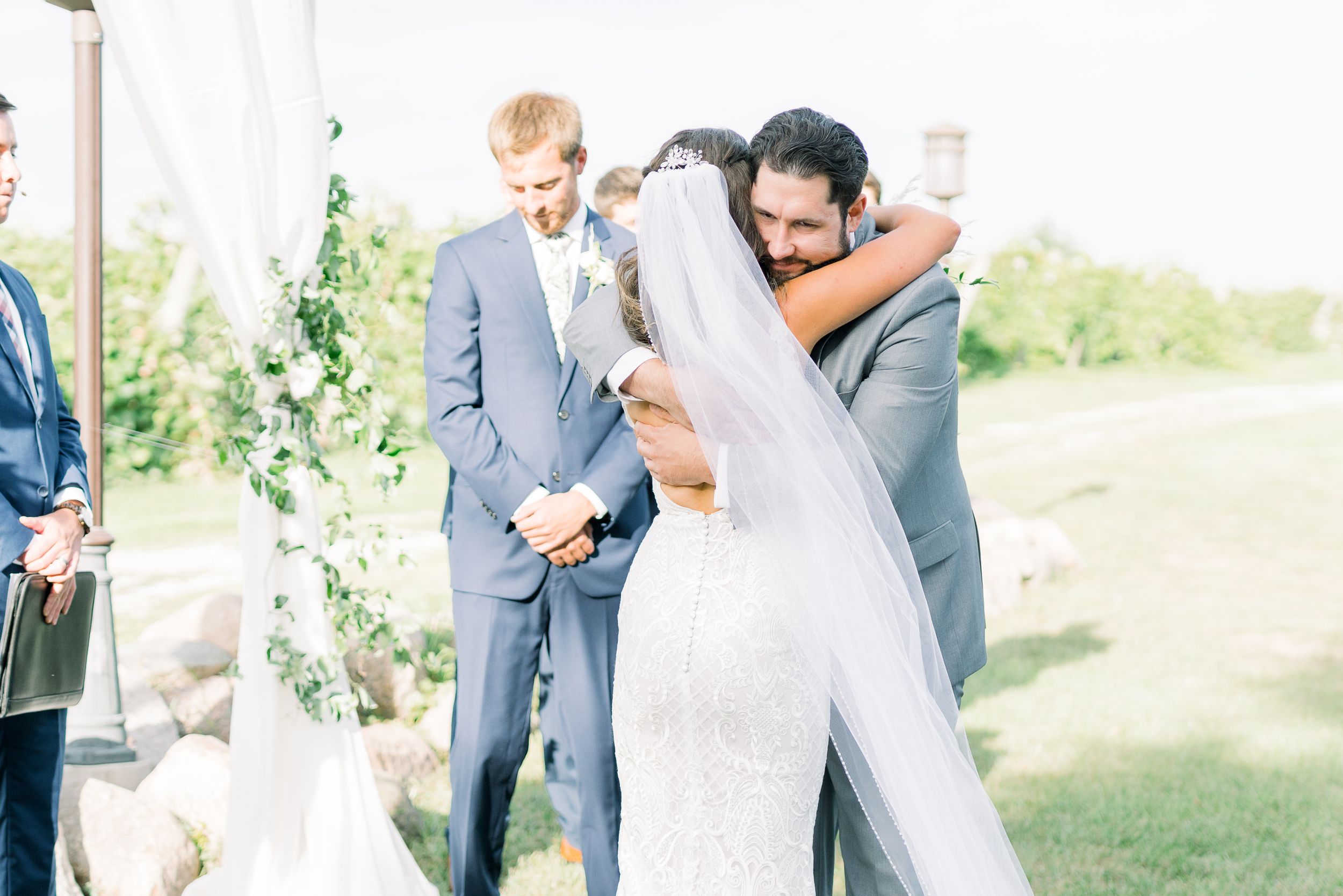 Vineyard photos with white willow events at Prairie Moon Winery wedding in Ames, Iowa