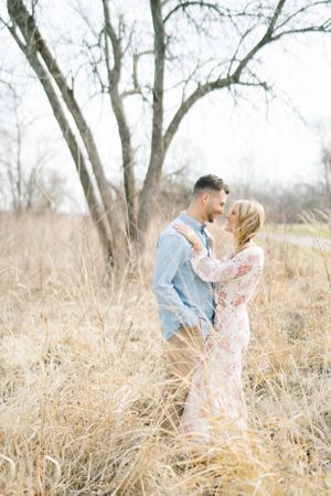 Light and airy film lakeside dock engagement session at Gray's Lake in Des Moines, Iowa