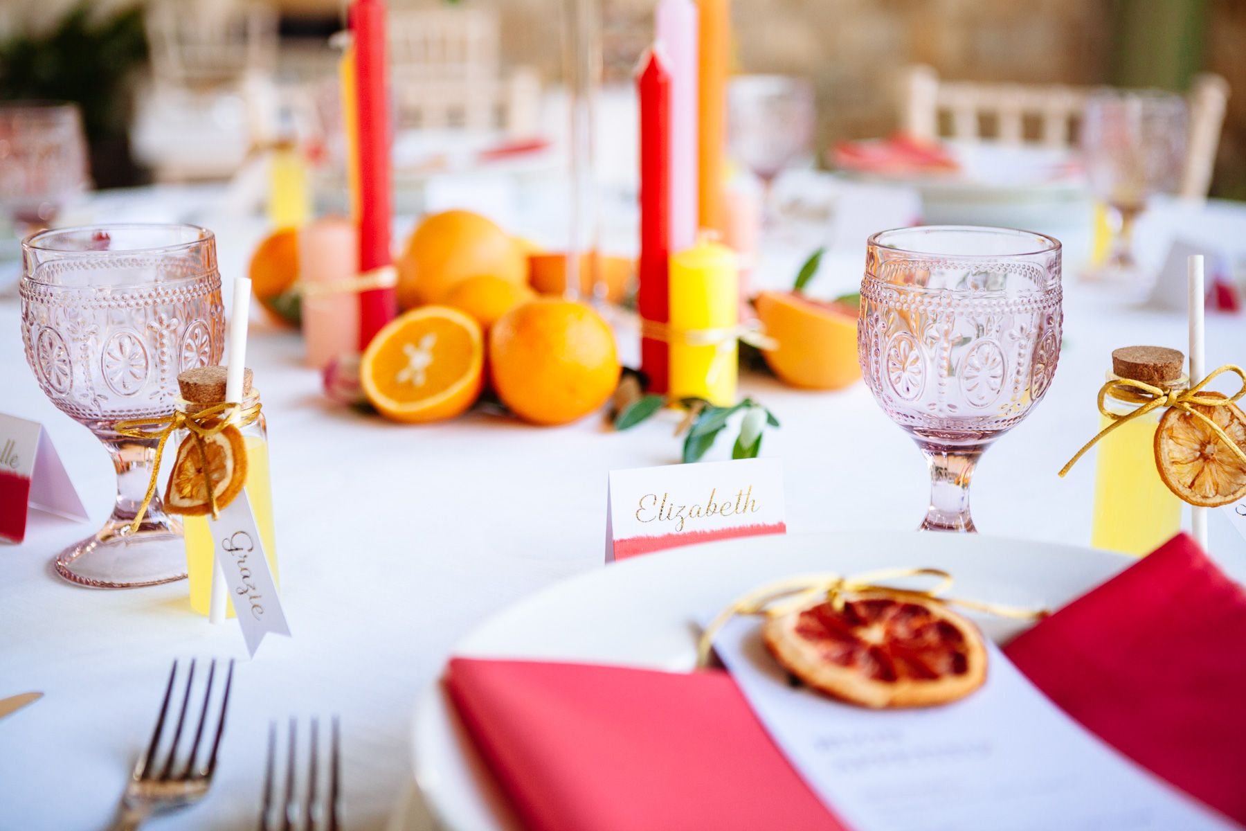 bright and bold table setting for intimate wedding in marina di pietrasanta, tuscany, italy