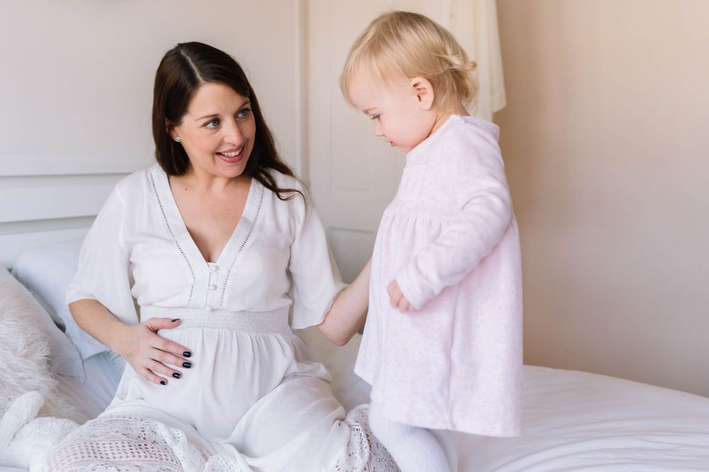 maternity photo session with sibling East London