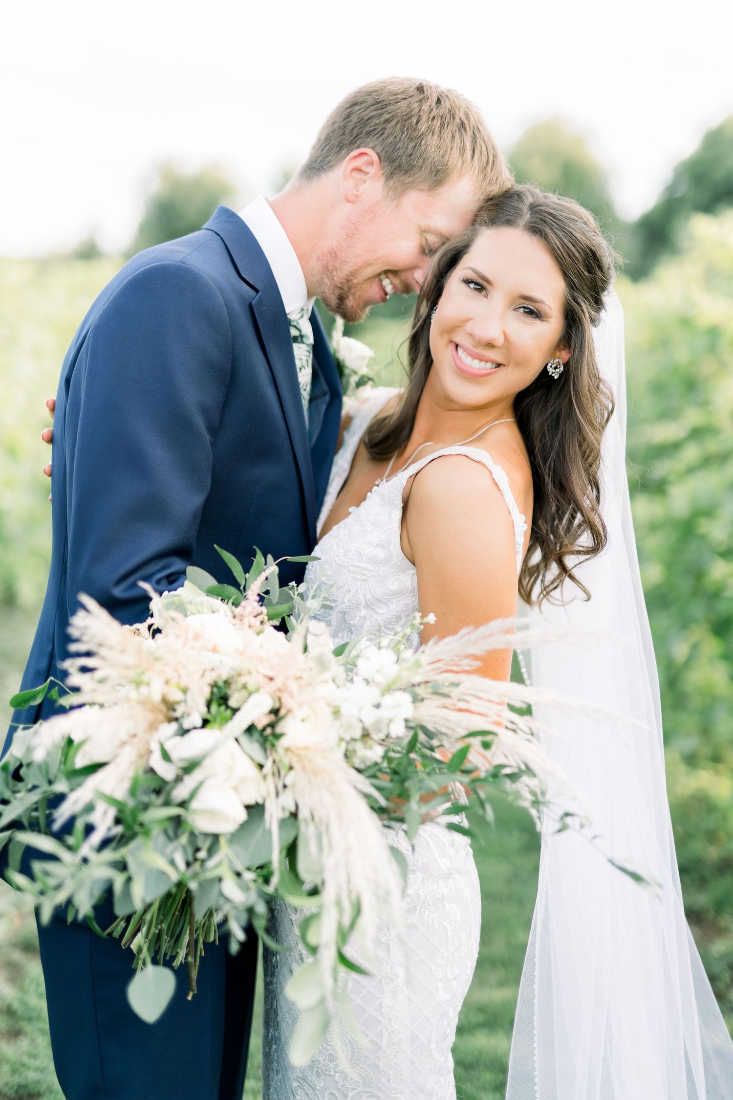 Vineyard photos with white willow events at Prairie Moon Winery wedding in Ames, Iowa