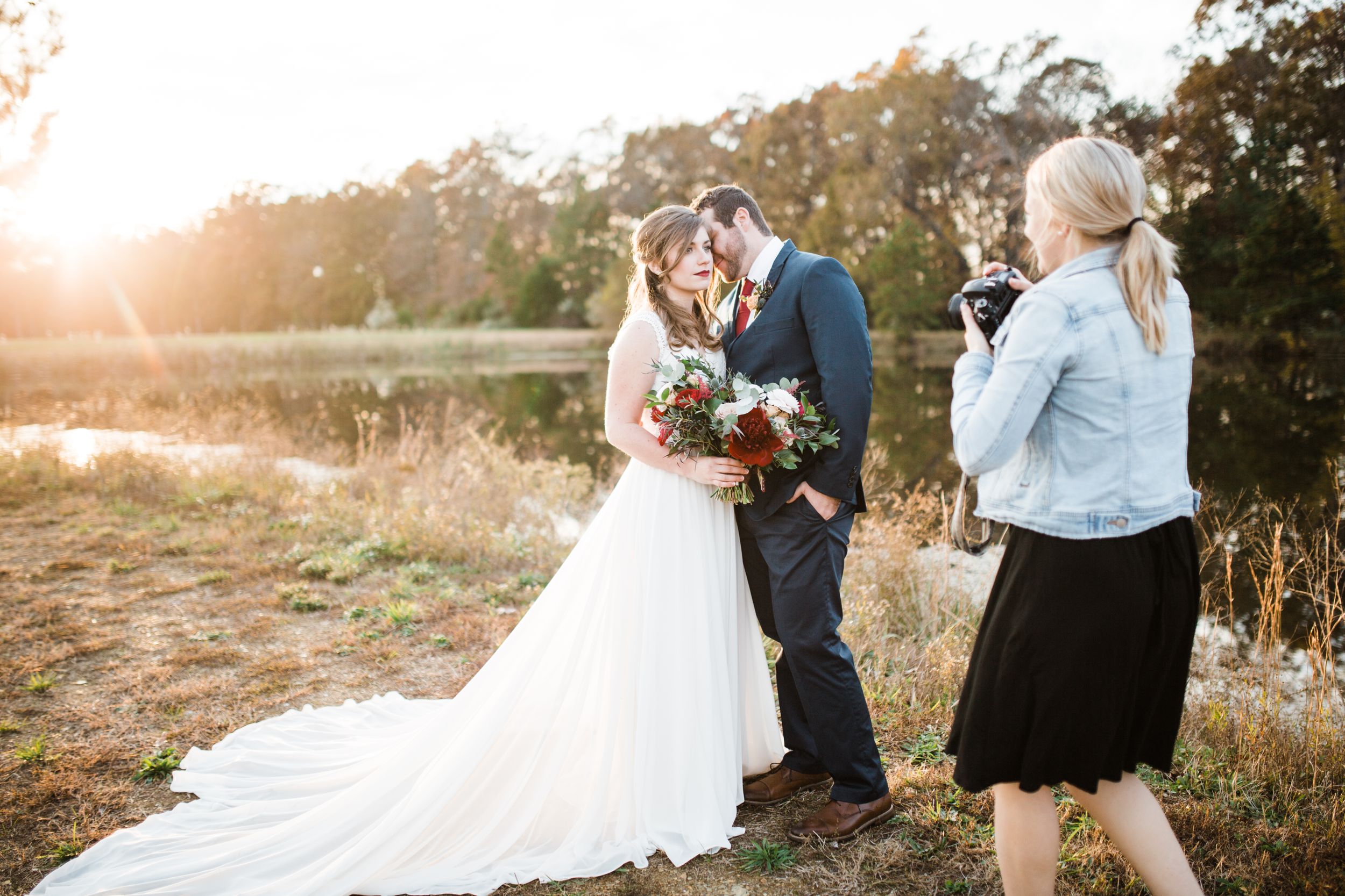 Rachel McIntyre with Kharis Photography behind the scenes at sunset