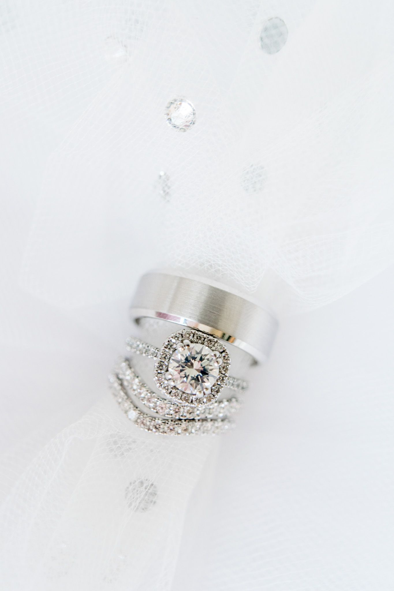 his and hers wedding rings for fall chicago wedding, diamond ring with halo and stackable wedding bands