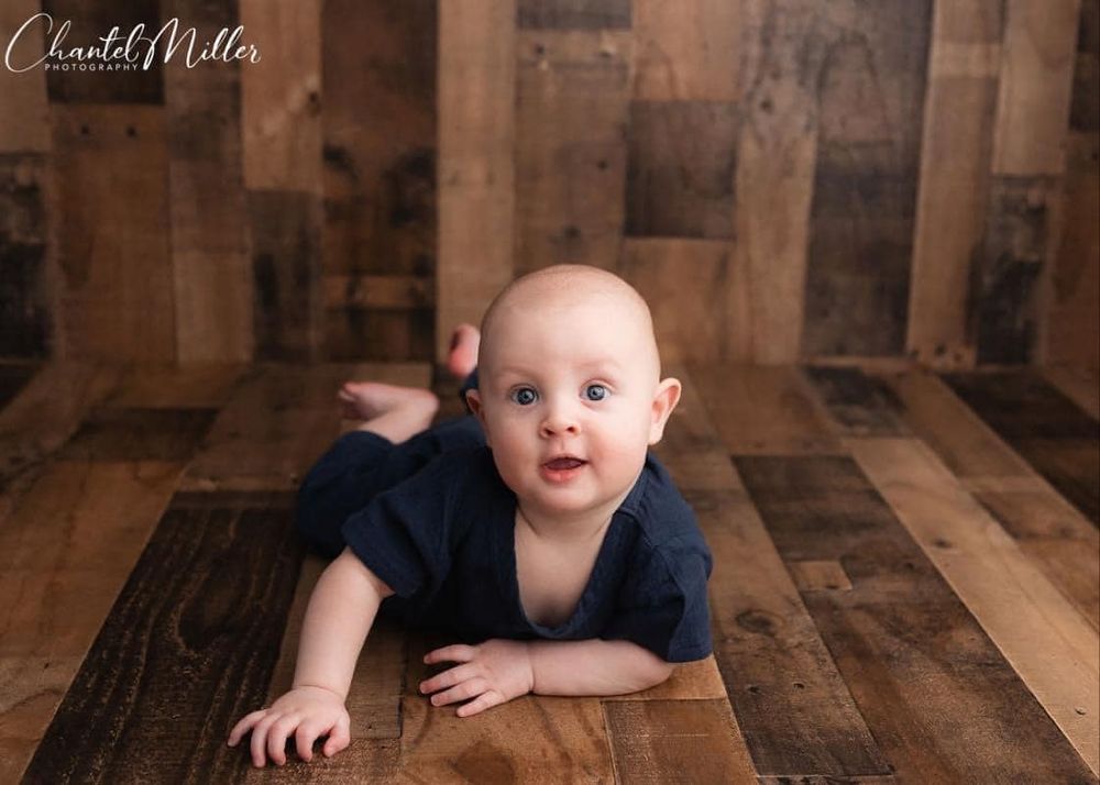 baby boy dressed in blue