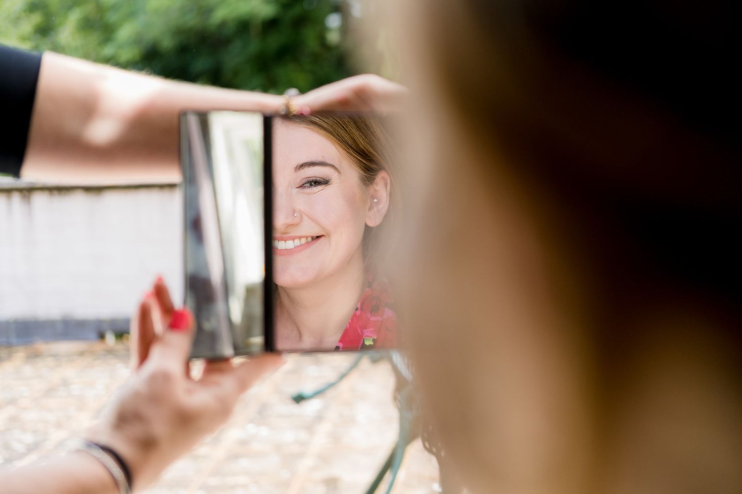 Bride having make up applied