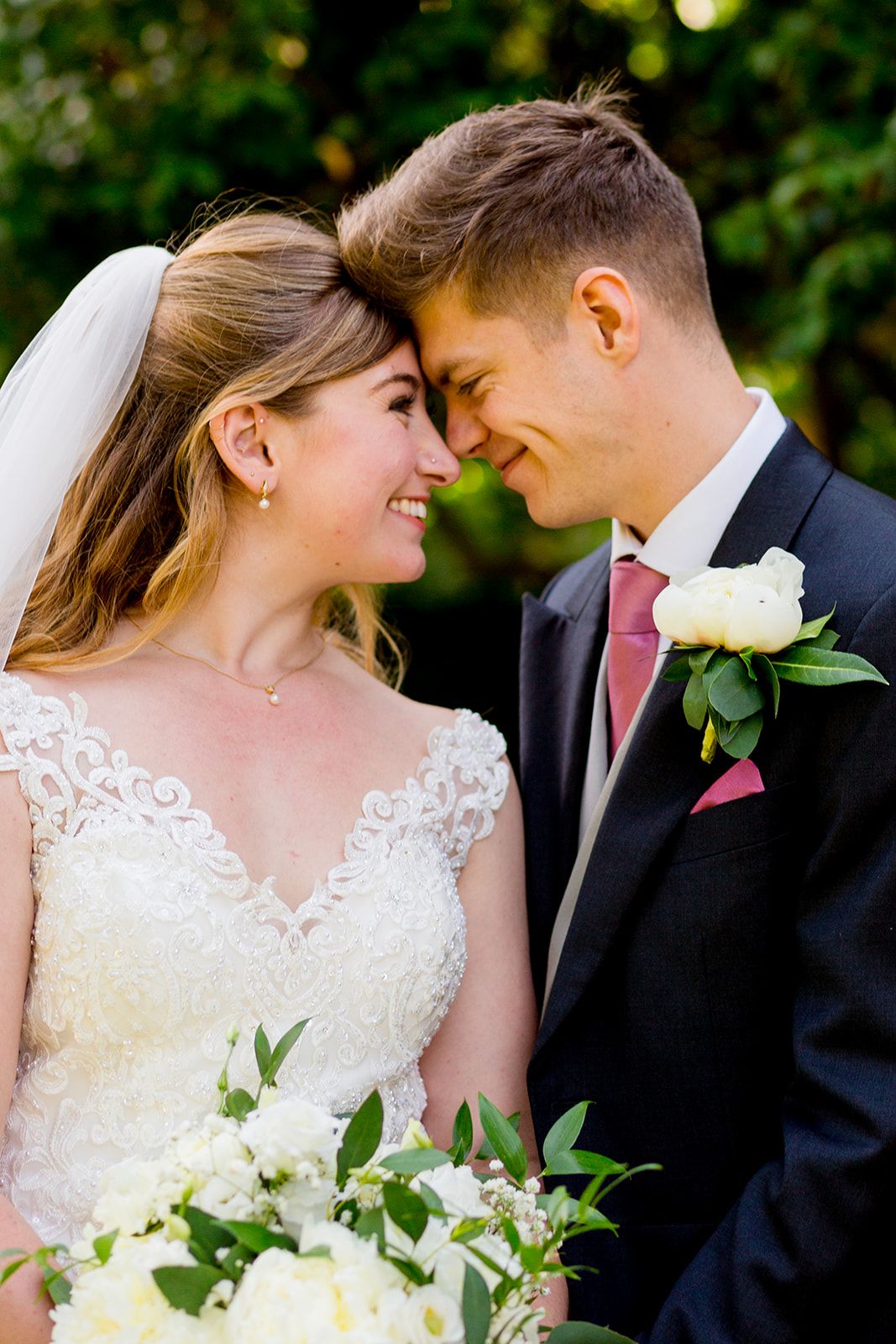 close up photo of bride and groom