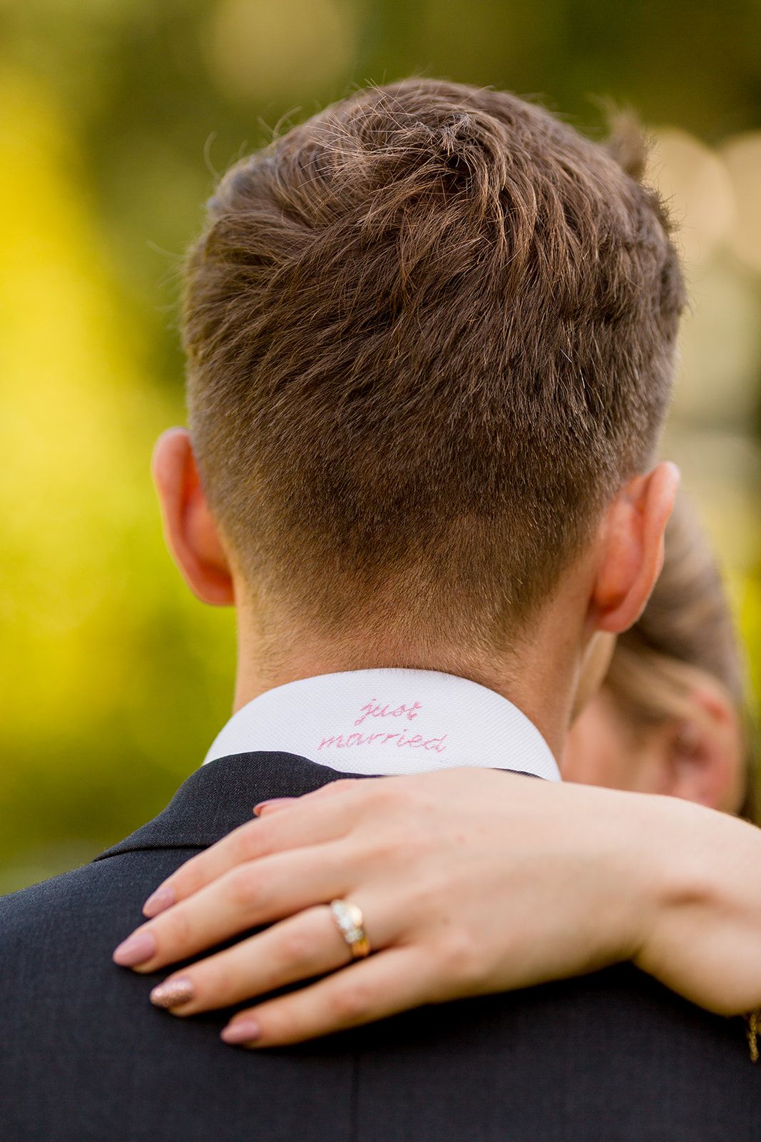 hand embroidered just married detail on grooms shirt