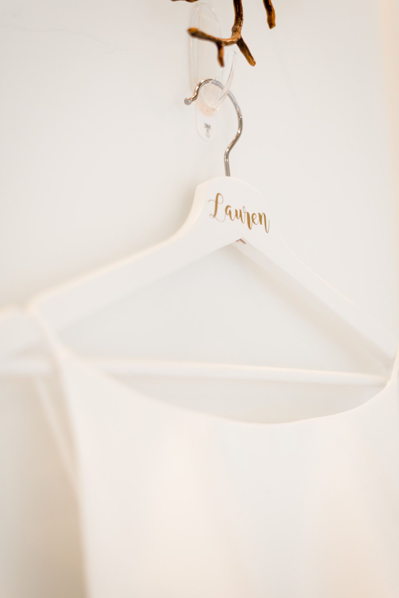 custom wooden bride dress hanger at fall chicago wedding
