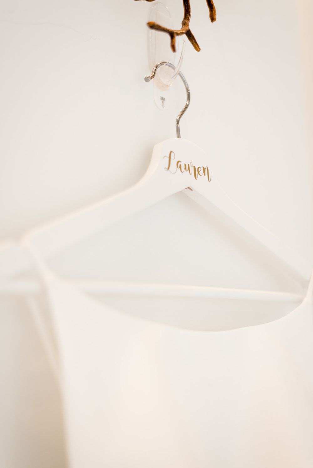 custom wooden bride dress hanger at fall chicago wedding