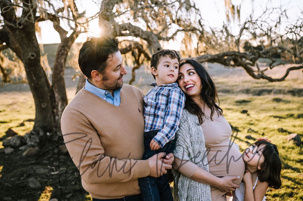 Sonoma County maternity photography session with beautiful pregnant mother, father, daughter, son at sunset