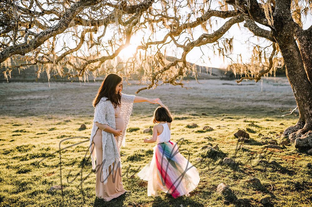 Sonoma County maternity photography session with beautiful pregnant mother, father, daughter, son at sunset