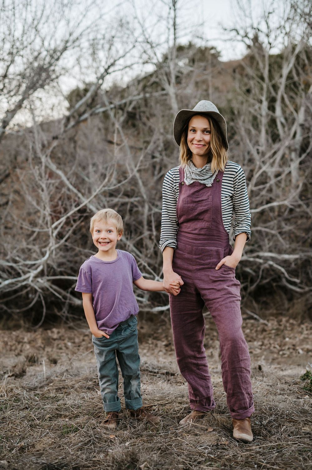 Playful motherhood and son family photography session outdoors on Sonoma County ranch.