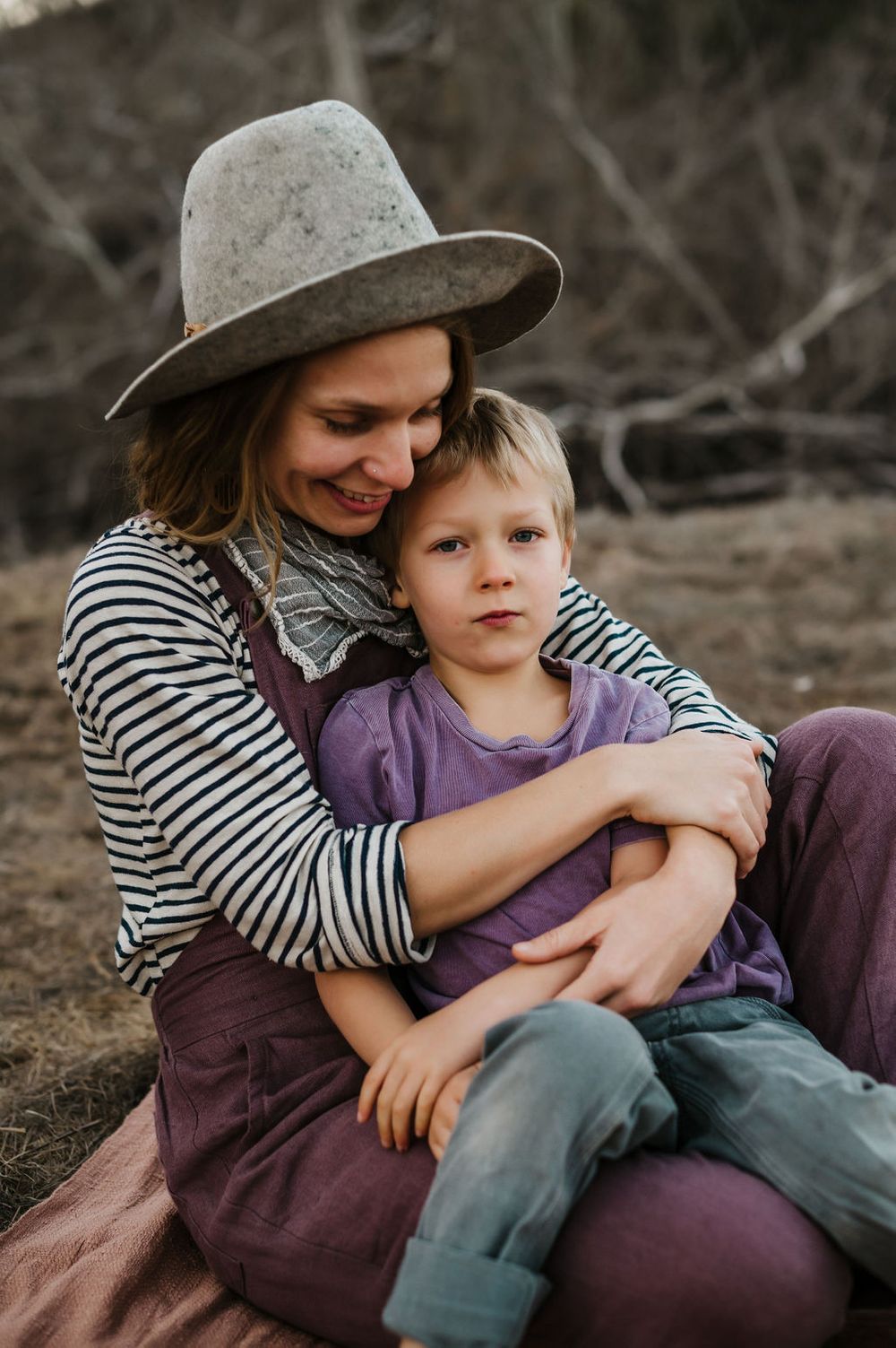 Playful motherhood and son family photography session outdoors on Sonoma County ranch.