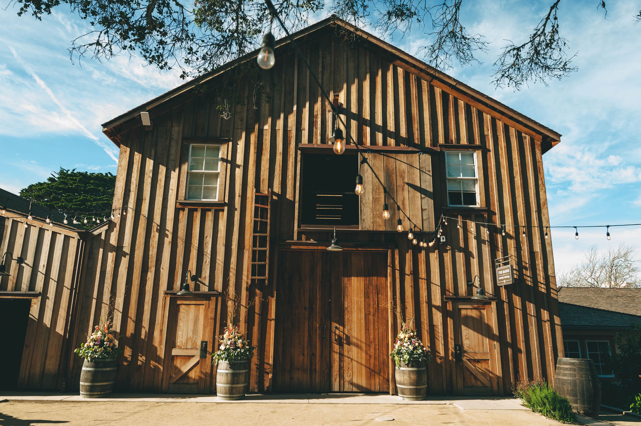 The barn from the front with doors closed at the Barns at Cooper Molera in Monterey.