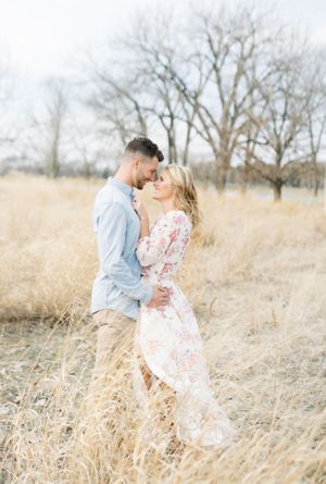 Light and airy film lakeside dock engagement session at Gray's Lake in Des Moines, Iowa
