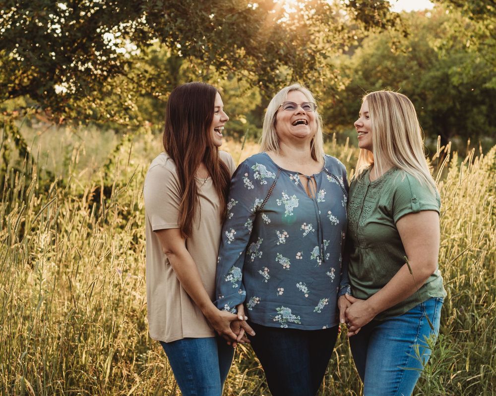 Professional photo of three women outdoors