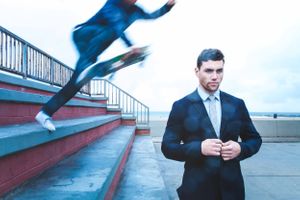 Actor Christian James Smoking in Suit Men's Fashion Trends Handball Court Venice Beach Interview Magazine