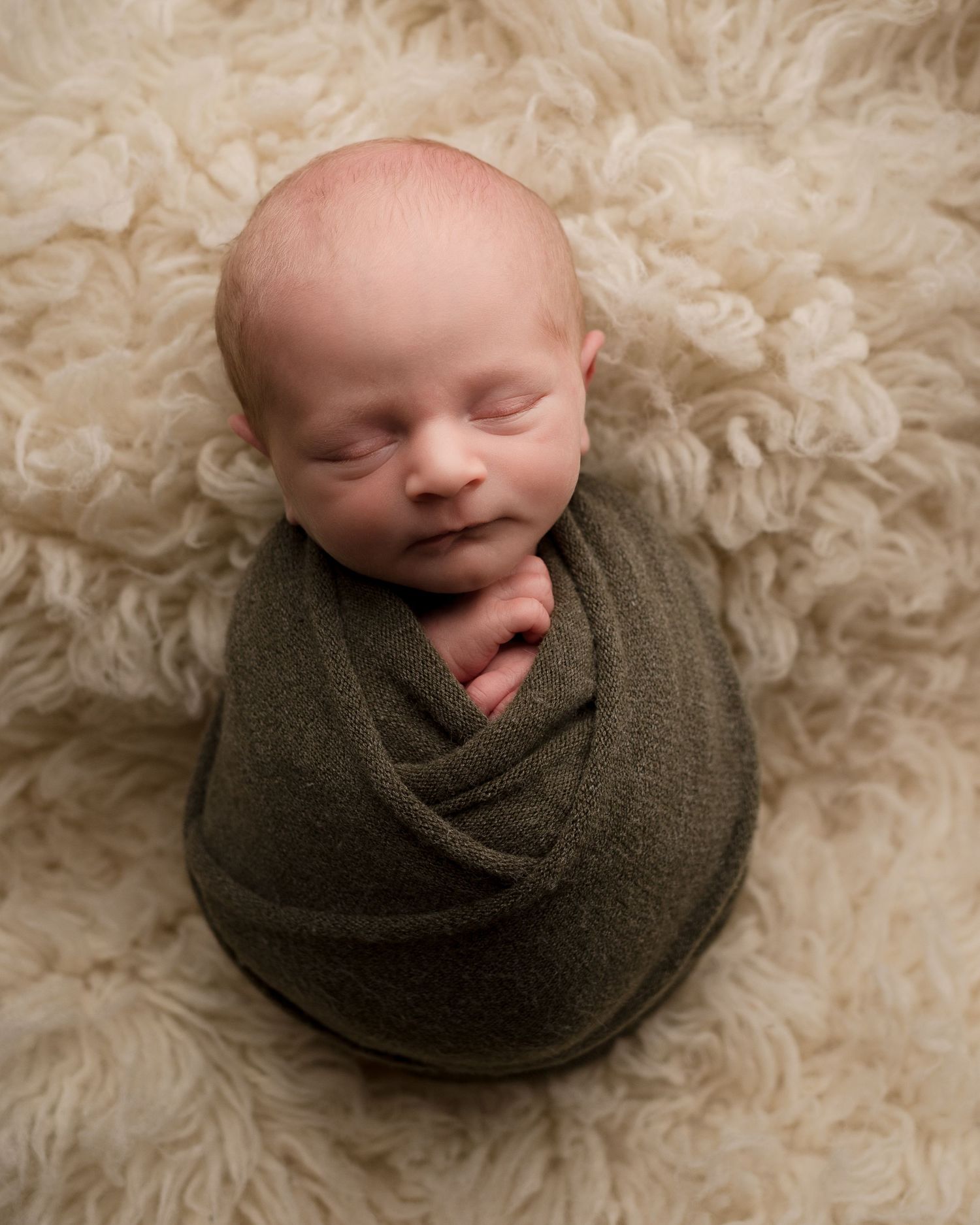 Professional newborn photo - green