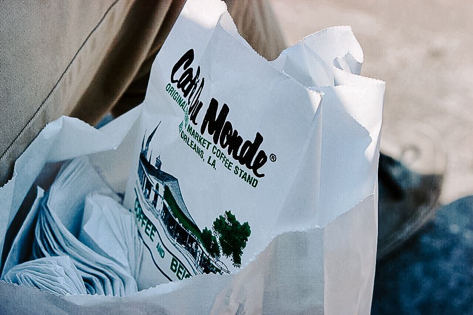 Cafe du Monde beignet bag with a lot of napkins
