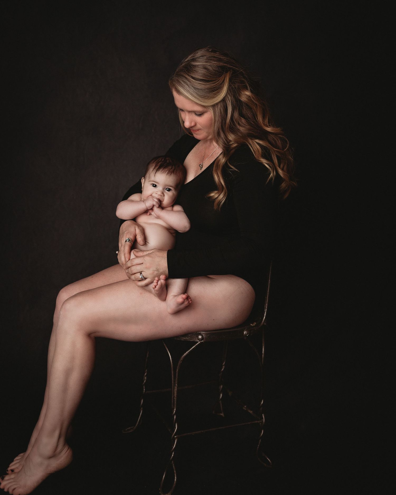 mom and daughter motherhood session studio photography black bodysuit