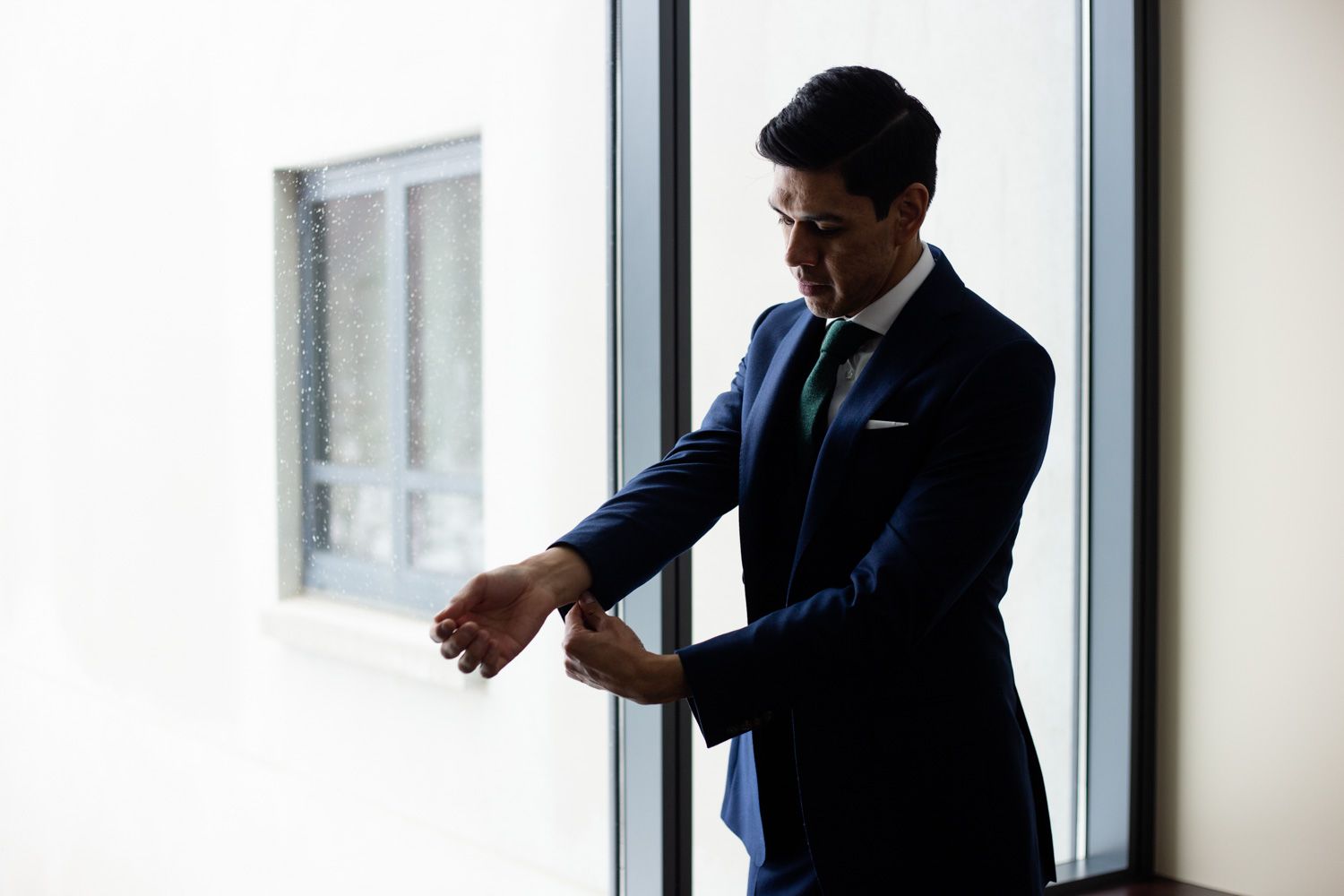 Groom getting ready in Tuxedo Park, New York wedding